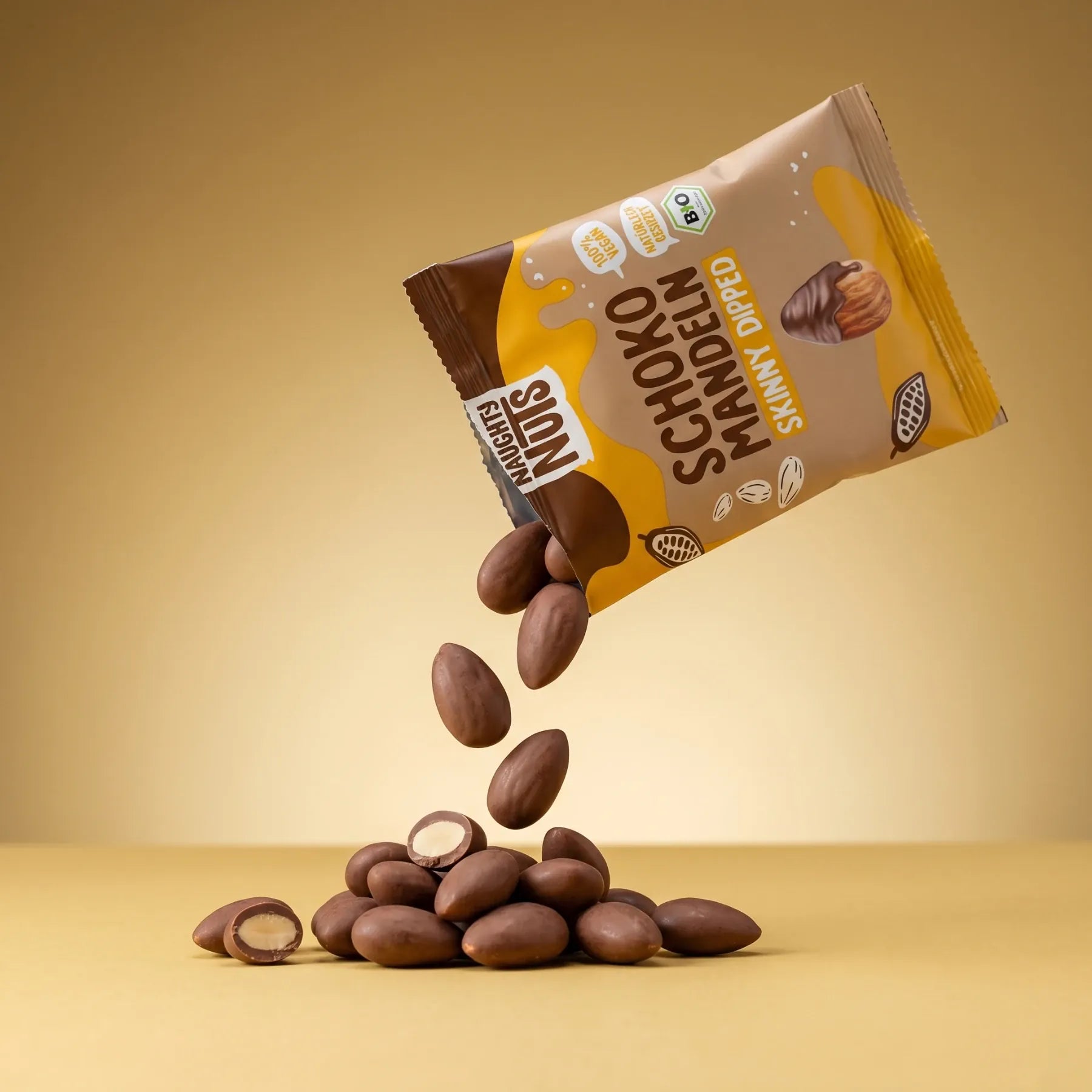Naughty Nuts Nüsse mit Schokoladenüberzug Bio Schoko-Mandeln (skinny dipped) - 10er Box
